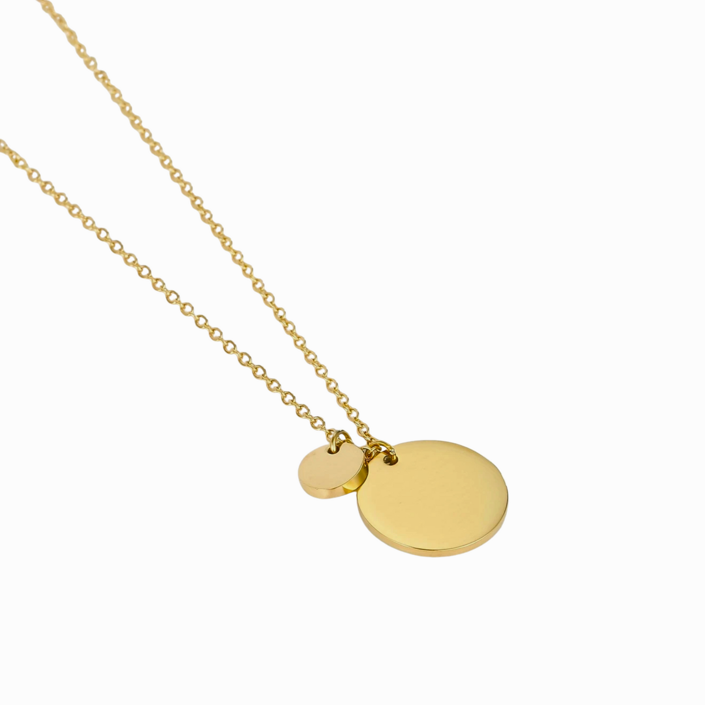 Close-up of 14k gold-plated minimalist circle necklace on white background.