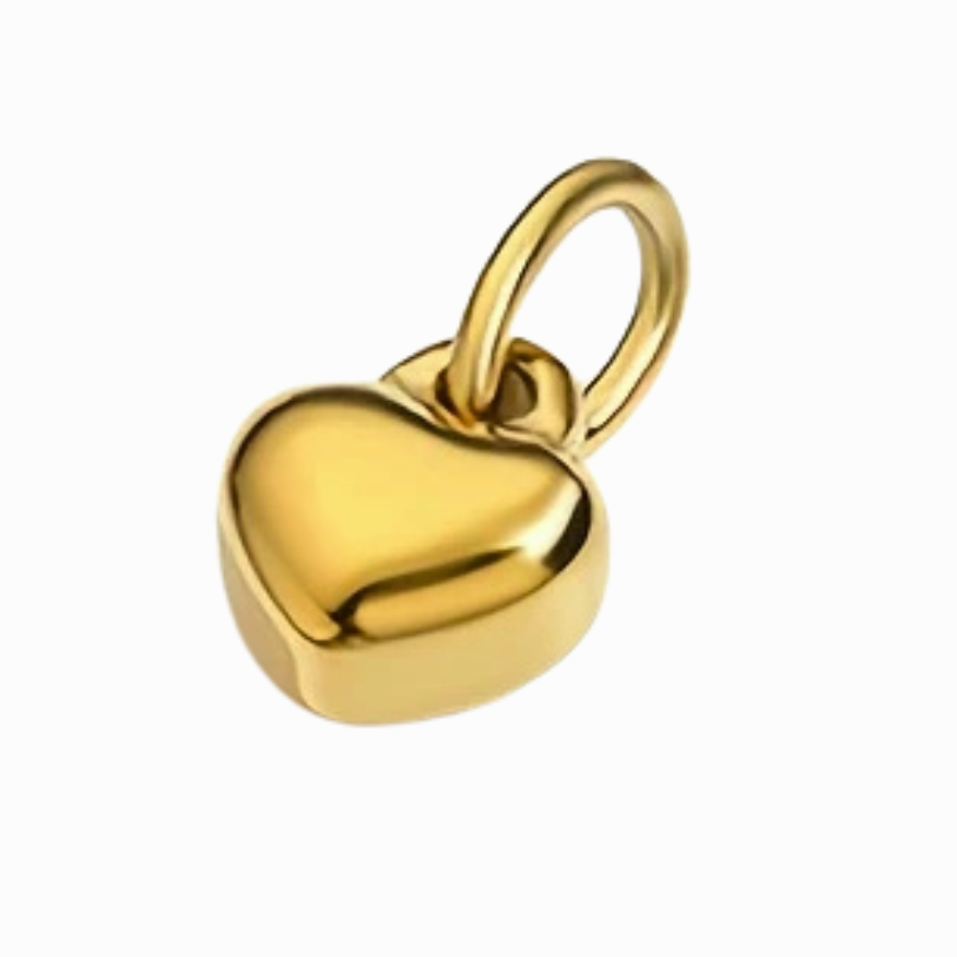 Gold heart-shaped pendant on a white background