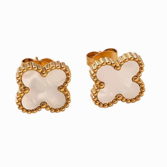 Pair of butterfly-shaped earrings with gold and beige design on a white background