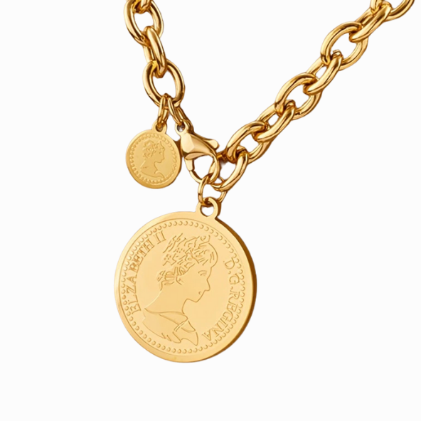Gold chain bracelet with a coin charm on a white background