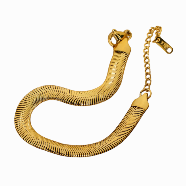Gold bracelet on a white background with a pink border