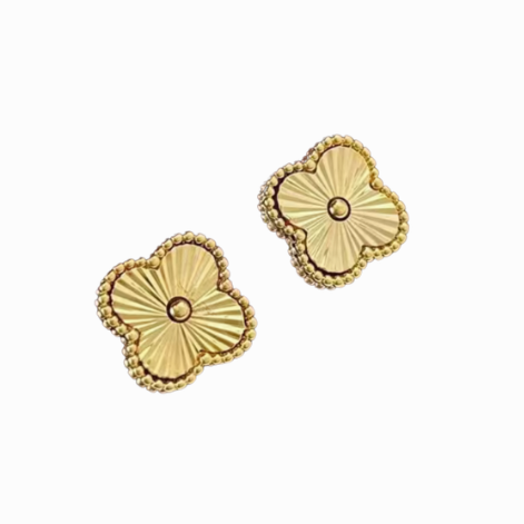 Gold floral earrings on a white background with a purple border