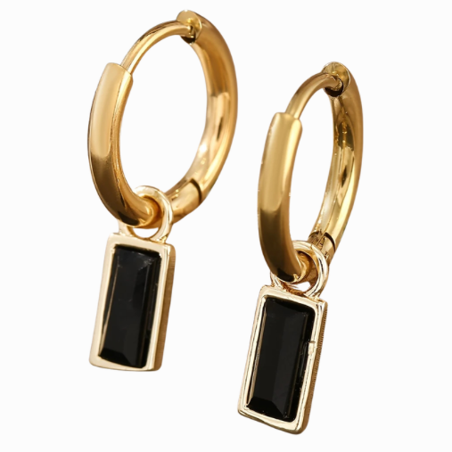 Gold hoop earrings with black rectangular stones on a white background