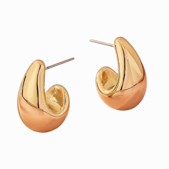 Gold hoop earrings on a white background