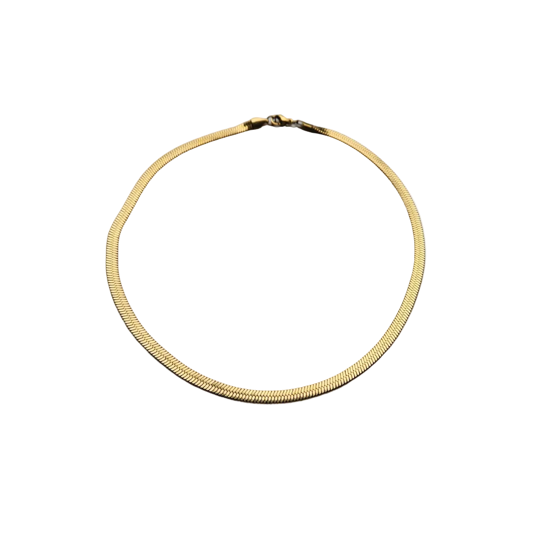Gold necklace on a white background