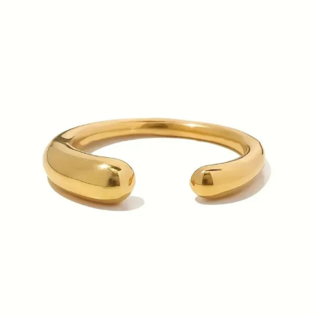 Gold open ring on a white background