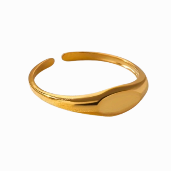 Gold ring on a white background