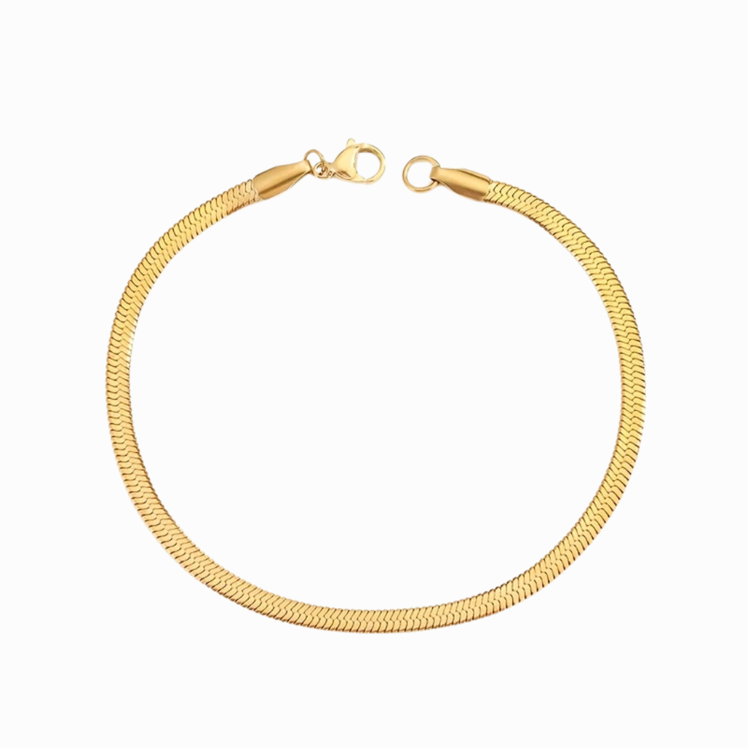 Gold bracelet on a white background