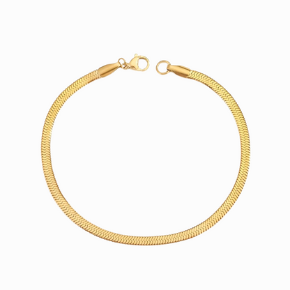 Gold bracelet on a white background