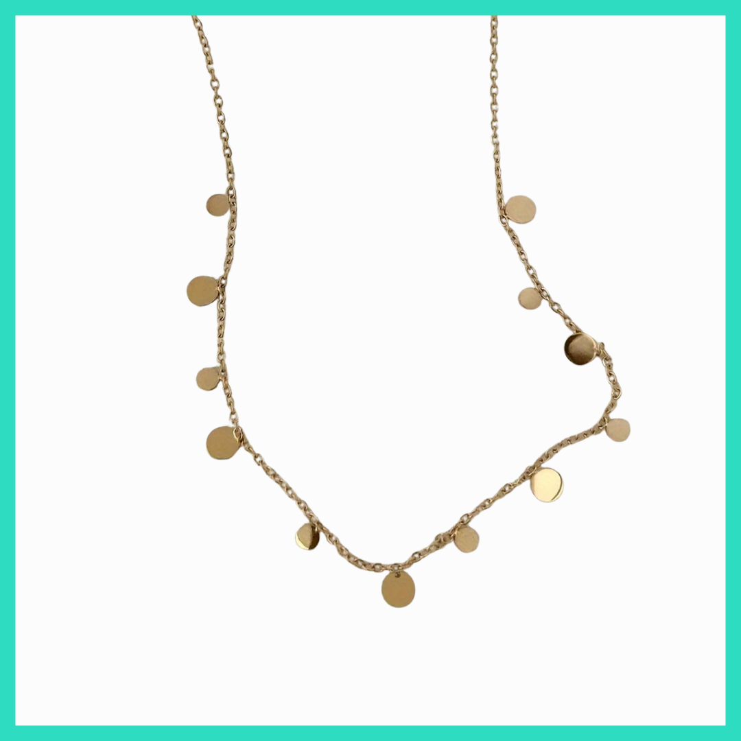 Gold necklace with round pendants on a white background