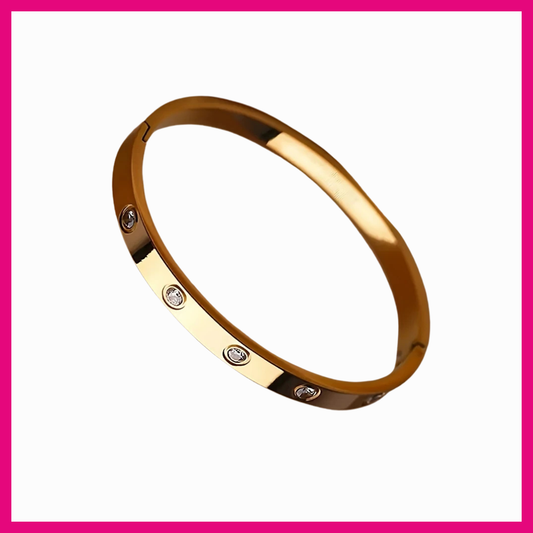 Gold bracelet on white backround 