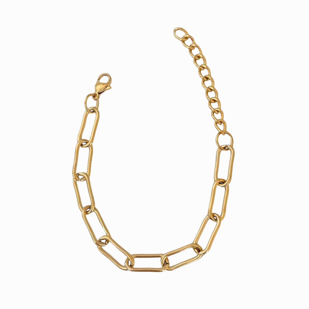 Gold chain necklace on a white background