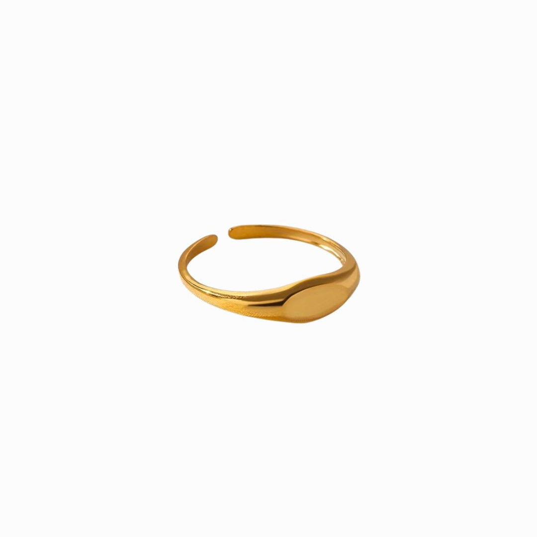 Gold ring on a white background