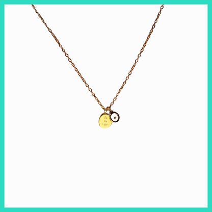 Necklace with round pendants on a white background