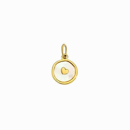 Gold pendant with a heart symbol on a white background