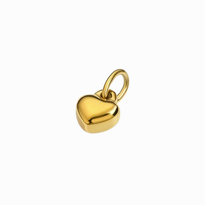 Gold heart-shaped pendant on a white background