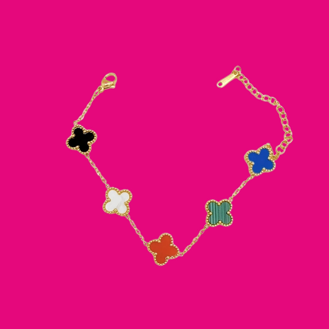 Colorful flower-shaped bracelet on a pink background