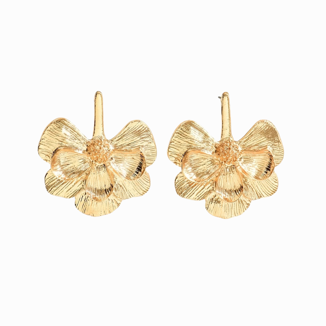 Gold butterfly earrings on a white background
