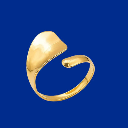 Gold ring on a blue background