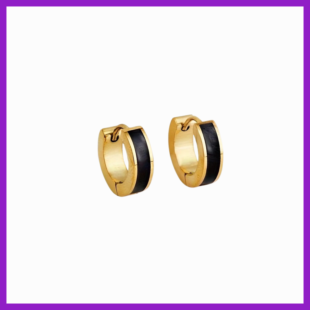 Gold hoop earrings with black interior on a white background