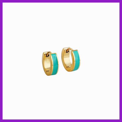 Gold hoop earrings with turquoise centers on a white background