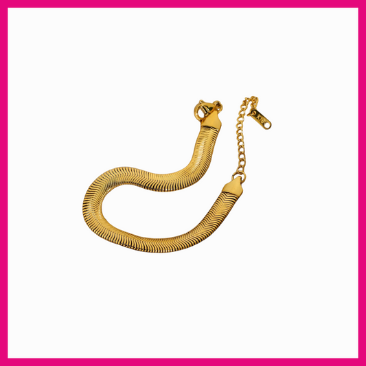 Gold bracelet on a white background with a pink border