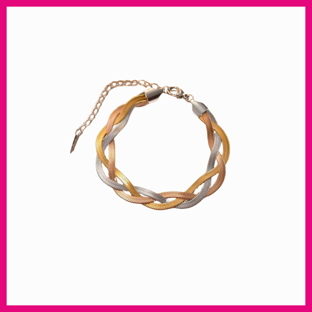 Bracelet with intertwined gold and silver strands on a white background