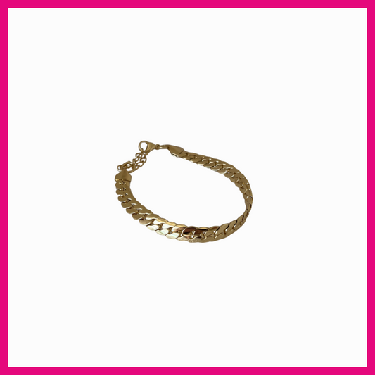Gold chain bracelet on a white background