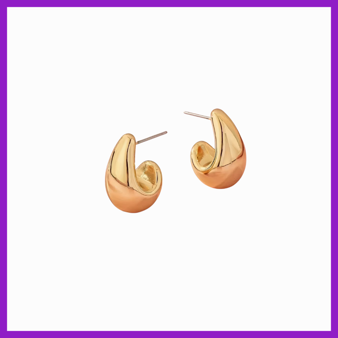 Gold hoop earrings on a white background