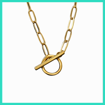 Gold chain necklace with a toggle clasp on a white background