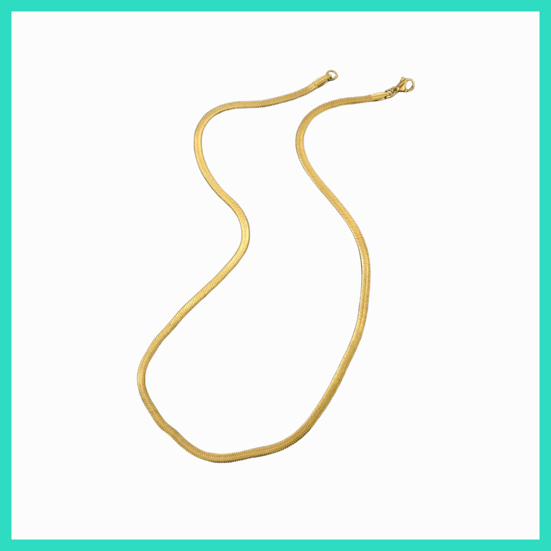 Gold necklace on a white background