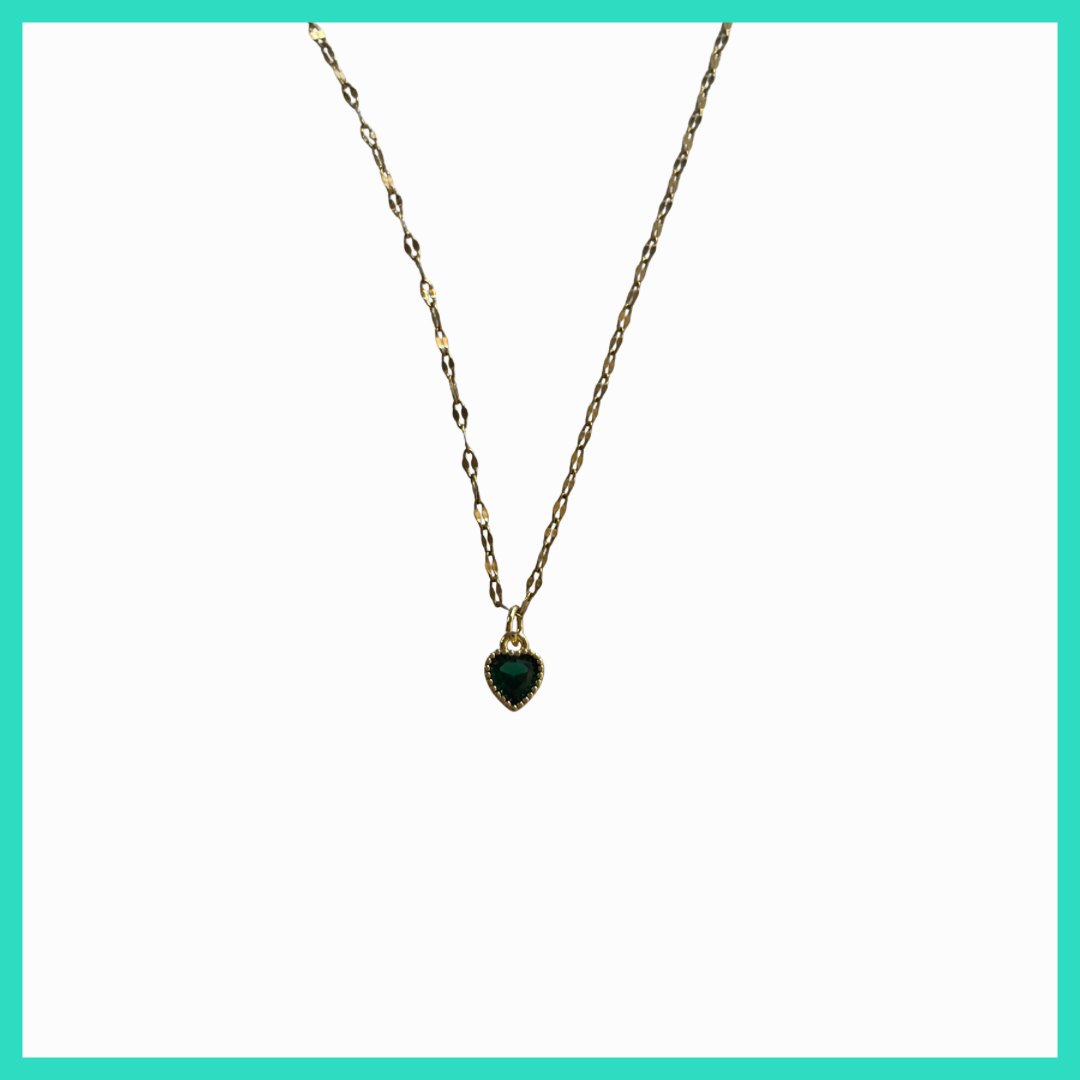 Necklace with a green heart-shaped pendant on a white background