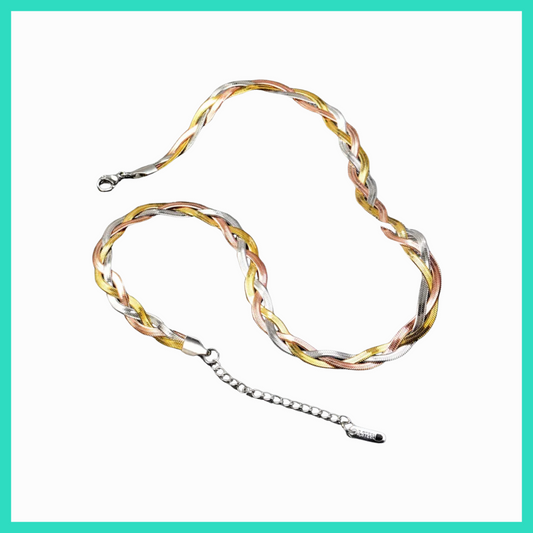 Multicolored braided necklace on a white background