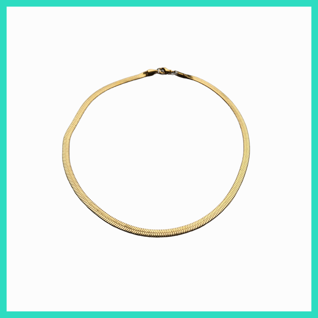 Gold necklace on a white background