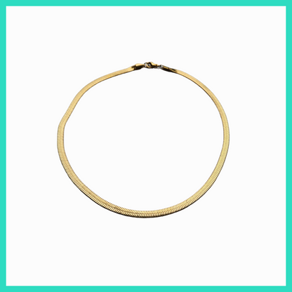 Gold necklace on a white background